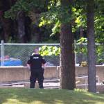 Tony Overman/The Olympian via AP                                Students leave The Evergreen State College campus in Olympia after a threat prompted a student alert and evacuation Thursday. The announcement posted on the school&rsquo;s website Thursday asked everyone to leave the Olympia campus or return to residence halls for further instructions. The post did not provide other details.                                An Evergreen State College police officer keeps watch over campus as student evacuate following a &ldquo;direct threat&rdquo; Thursday. (Tony Overman/The Olympian via AP)