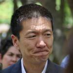 Hawaii Attorney General Douglas Chin talks about a U.S. appeals court decision on President Donald Trump&rsquo;s revised travel ban Monday in Honolulu. (Caleb Jones/The Associated Press)