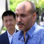 Hakim Ouansafi, president of the Muslim Association of Hawaii, right, speaks during a news conference as Hawaii Attorney General Douglas Chin, left, listens after a U.S. appeals court decision on President Donald Trump&rsquo;s revised travel ban Monday in Honolulu. (Caleb Jones/The Associated Press)