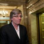 Democratic Rep. Timm Ormsby talks to the media in the House wings about the state of budget negotiations Tuesday in Olympia. (Rachel La Corte/The Associated Press)