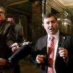 Republican Senate Majority Leader Mark Schoesler talks to the media in the Senate wings after a state budget deal was announced Wednesday in Olympia. (Rachel La Corte/The Associated Press)