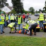 Community Emergency Response Team members treat &ldquo;victims&rdquo; of an earthquake during Saturday&rsquo;s drill. (Michael Dashiell/Olympic Peninsula News Group)