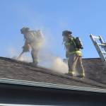 Matthew Nash (2)/Olympic Peninsula News Group                                A fire spread through the attic of a home on the 200 block of Griffith Farm Road on Sunday. Clallam County Fire District No. 3, with support from Clallam County Fire District No. 2 extinguished the fire in about two hours.
