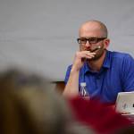 Port Angeles School Board President Josh Jones listens to public comment about the proposed health center at Port Angeles High School during the board&rsquo;s meeting Thursday. The school board approved pursuing a health center in a 4-to-1 vote. (Jesse Major/Peninsula Daily News)