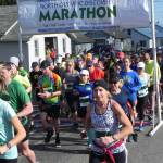 Runners and walkers in the North Olympic Discovery half-marathon got their start at 8 a.m. Saturday along Barr Road opposite the Agnew soccer fields. They were headed for a finish in downtown Port Angeles. (Mark Swanson/Peninsula Daily News)