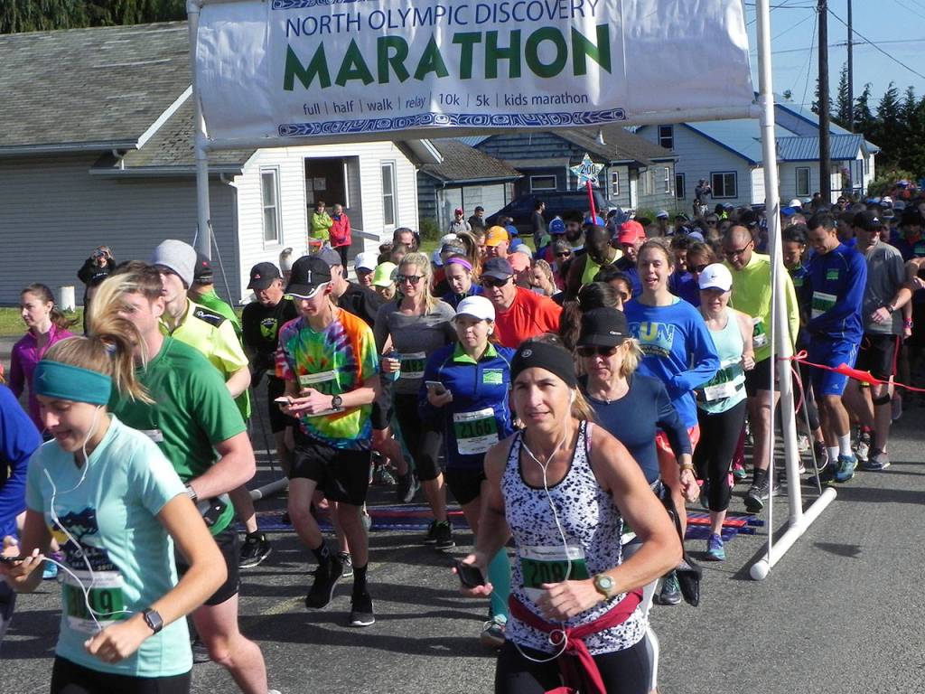 Runners and walkers in the North Olympic Discovery half-marathon got their start at 8 a.m. Saturday along Barr Road opposite the Agnew soccer fields. They were headed for a finish in downtown Port Angeles. (Mark Swanson/Peninsula Daily News)