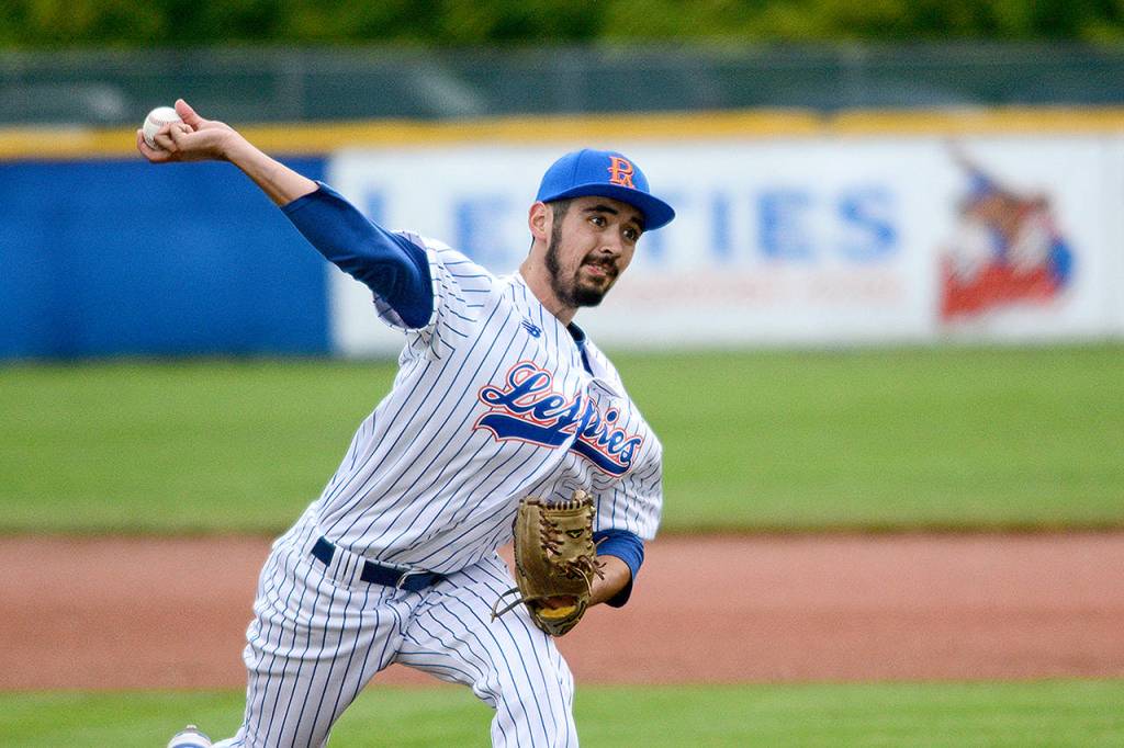 Jesse Major/Peninsula Daily News                                Port Angeles Lefties pitcher Nick Caudillo pitches against the Victoria HarbourCats in Port Angeles on Thursday.
