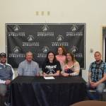 Peninsula College Athletics                                Sequim&rsquo;s Erin Vig (center) in May signs a letter of intent to play at Peninsula College this fall. Joining her are, from left, PC head coach Kanyon Anderson, dad Craig, sister Lainey, mom Julie and Sequim High head coach Derek Vandervelde.