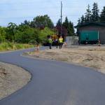 A recently paved section of the Olympic Discovery Trail now loops around the Carlsborg Sewer Project&rsquo;s pump station north of Savannah and Village lanes. It&rsquo;s one of the final pieces for the project, which finishes this week. (Matthew Nash/Olympic Peninsula News Group)