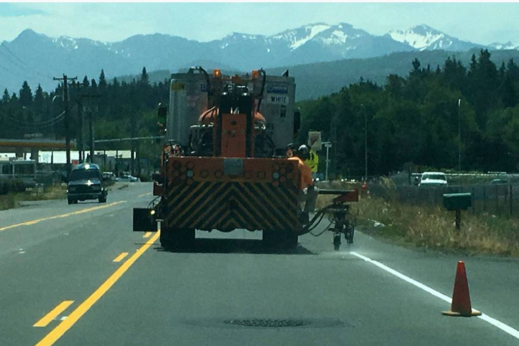 Crews recently painted new lines on Carlsborg Road, including a center turn lane, following the completion of the Carlsborg Sewer Project. (Matthew Nash/Olympic Peninsula News Group)
