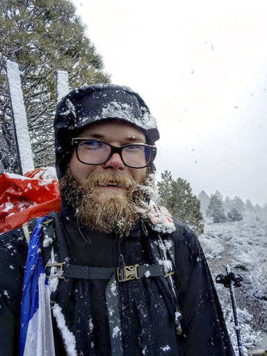This May 15 selfie shows hiker Brien Bower in a snowstorm along the Pacific Crest Trail in California&rsquo;s southern Sierra Nevada. Bower, who hiked the 2,600-mile trail in 2015, detoured from the trail this spring after being caught in an avalanche and encountering dangerous river crossings and ended his effort to complete the hike after getting sick. (Brien Bower via AP)