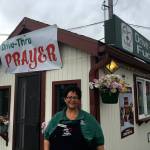 Matthew Nash (2)/Olympic Peninsula News Group                                WeDo Fudge co-owner Christina Norman stands outside her business, which now offers prayer in its drive-thru. She said people tell her a lot when they stop by, so she wanted to offer them prayer if needed.
