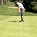 Dave Logan/for Peninsula Daily News                                Jack Shea, 19, putts on the 18th hole at Cedars at Dungeness Sunday to win the three-day Clallam County Amateur Golf Tournament with scores of 70-69-72 for a 211. Shea, a Sequim High School golfer who graduated in 2016, has won the event two years in a row.