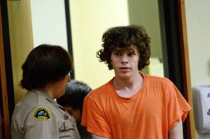 Joseph Warren Recoy, 24, is escorted into Clallam County Superior Court on Tuesday. (Jesse Major/Peninsula Daily News)