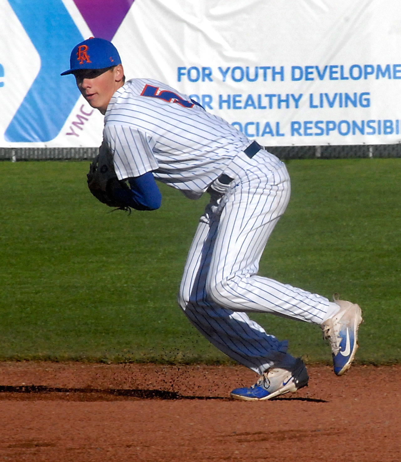 The Lefties&rsquo; Kevin Kendall prepares to throw to first in a June 20 game against the Bend Elks at Civic Field. Kendall, 18, will be a freshman at UCLA this fall and is one of the youngest players in the West Coast League.                                Keith Thorpe/Peninsula Daily News