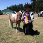 The Pony Express 4-H club&rsquo;s Natalie Blankenship and her miniature horse won the Grand Championship in Halter class at last weekend&rsquo;s Clallam County Neon Rider&rsquo;s 4-H horse show. (Karen Griffiths/for Peninsula Daily News)
