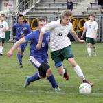 Port Angeles&rsquo; Ben Schneider dribbles past a North Mason player. Schneider has been selected as the All-Peninsula Boys Soccer MVP.                                Keith Thorpe/Peninsula Daily News