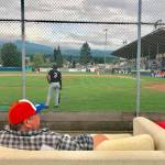 Port Angeles Lefties fans watch a game at Civic Field from the comfort of couches lined up behind the backstop Friday. (Paul Gottlieb/Peninsula Daily News)