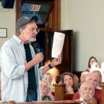 Dan Nieuwsma of Port Townsend expresses some concerns he has about a proposed property tax levy at a public hearing that was attended by over 100 community members Monday night. (Cydney McFarland/Peninsula Daily News)