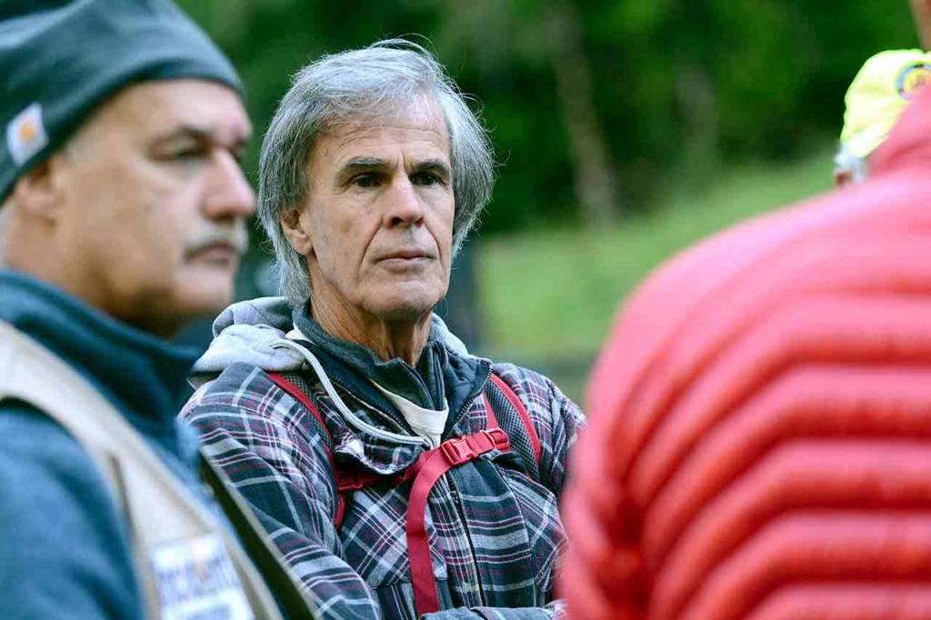 Randy listens during a briefing before the search Saturday for his son, Jacob Gray, who has been missing since early April. (Jesse Major/Peninsula Daily News)