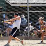 Hit For Brains batter Parker Browning connects for a two-run homer at Tillicum Park in Forks during the Fred Orr Memorial Co-Ed softball tournament&rsquo;s championship game. Hit For Brains sponsored by Subway-Union 76 of Forks won the championship game 8-4. Catching is Jessie Olson and umpiring is Randy Rooney. (Lonnie Archibald/for Peninsula Daily News)