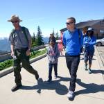 Mikah Meyer, 31, right, chats with a ranger at Hurricane Ridge on Wednesday. (Jesse Major/Peninsula Daily News)