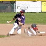 Dave Logan/for Peninsula Daily News Wilder Junior&rsquo;s Milo Whitman slides into second as Wilder Senior&rsquo;s Matt Hendry takes the throw. Whitman was caught stealing on the play.