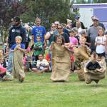 Kids compete in sack races at Tillicum Park in as part of the town&rsquo;s Old Fashioned Fourth of July celebration on Sunday. (Lonnie Archibald/for Peninsula Daily News)