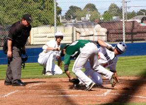 Dave Logan/for Peninsula Daily News                                Matt Hendry of Wilder Senior (16) is out at home in a play at the plate against Lakeside Recovery as Lakeside pitcher Brendan Maltos applies the tag. Watching on the play is Wilder&rsquo;s Bo Bradow (6). Wilder was able to come from behind then hold on to win the Firecracker Invitational championship 5-4.