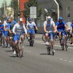 Keith Thorpe/Peninsula Daily News Members of the Port Angeles Lefties baseball team ride bicycles in the 100 block of West First Street in downtown Port Angeles on Thursday to promote their upcoming &ldquo;Bike to a Ballgame&rdquo; night, scheduled for July 15. The team, an affiliate of the West Coast League, is encouraging fans to ride their bicycles to the game, a matchup with the Corvallis Knights at Port Angeles Civic Field. Gametime is 6:45 p.m.
