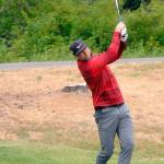 Keith Thorpe/Peninsula Daily News Casey Northern of Port Angeles tees off on the first hole on Friday at Peninsula Golf Club in Port Angeles during the Clallam County Amateur Tournament.