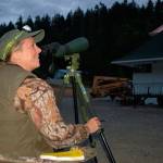 Shelly Ament, Department of Fish and Wildlife assistant district biologist for Clallam and west Jefferson counties, points to one of the areas at the Dungeness Fish Hatchery where bats exit the building to hunt for food in the evenings. Below, two bats roost in a structure at the hatchery where local biologists took bat guano and swab samples to send in for testing of white-nose syndrome. (Erin Hawkins/Olympic Peninsula News Group)