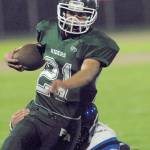 Jarrett Burns of Port Angeles rushes in a September 2016 matchup against North Mason.                                Keith Thorpe/Peninsula Daily News