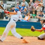 Aki Buckson smacks the game-winning hit in the bottom of the 11th to hand the Lefties a hard-fought 17-16 win Sunday. (Jay Cline/for Peninsula Daily News)