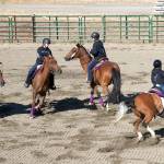 The Silver Spurs Drill Team performs a routine during opening day of the Jefferson County Fair in Port Townsend last year. The team, all from Port Townsend are, in no particular order, Rachel Doan, Kathryn McKenny, Jaden Schmidt and Karley Caseser. (Steve Mullensky/for Peninsula Daily News)