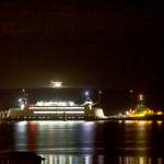 Steven Mullensky/for Peninsula Daily News                                The MV Salish is hooked up to a tug late Friday night in order to be towed to a repair facility after running aground while approaching Keystone Harbor last Tuesday.