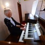 Anne Todnem of Port Angeles plays the organ at First United Methodist Church in Port Angeles as service begins Sunday, two days before her 100th birthday. (Jesse Major/Peninsula Daily News)