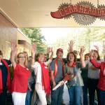 Debbie and Larry Williams, center, owners of Gear Head Deli in Quilcene, celebrate joining the Jefferson County Chamber of Commerce with a ribbon-cutting Wednesday. (Cydney McFarland/Peninsula Daily News)