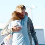 State Rep. Mike Chapman, D-Port Angeles, hugs Monica Farris, who spoke about her recovery Thursday during International Overdose Awareness Day activities in Port Angeles. (Jesse Major/Peninsula Daily News)