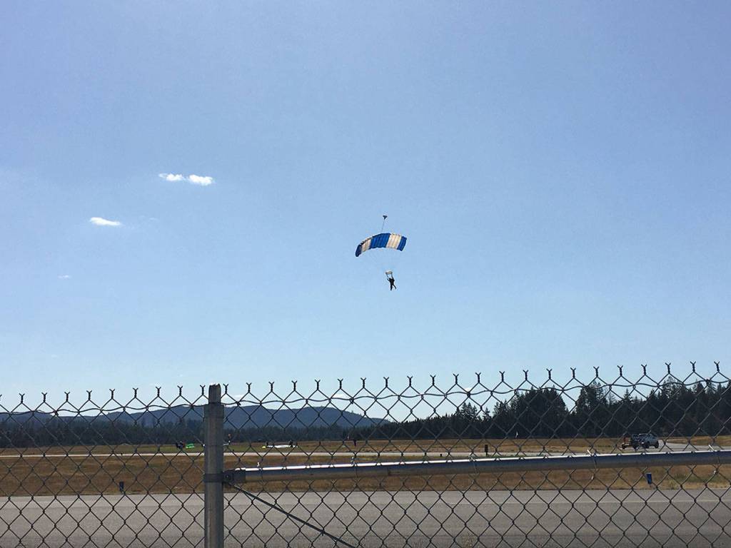 Dungeness&rsquo; Clairee Meeks safely descends to the runway in Shelton on Aug. 25 after skydiving for the sixth time. She plans to keep jumping annually and may take up lessons with her grandson.