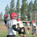 Steve Mullensky/for Peninsula Daily News Noa Apker-Montoya throws during a preseason practice last month. The Redhawks face Port Angeles tonight in their season opener.