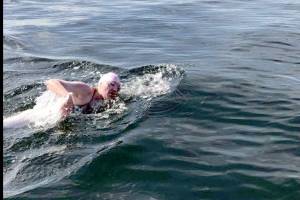 Swimmer makes it across Strait in less than eight hours