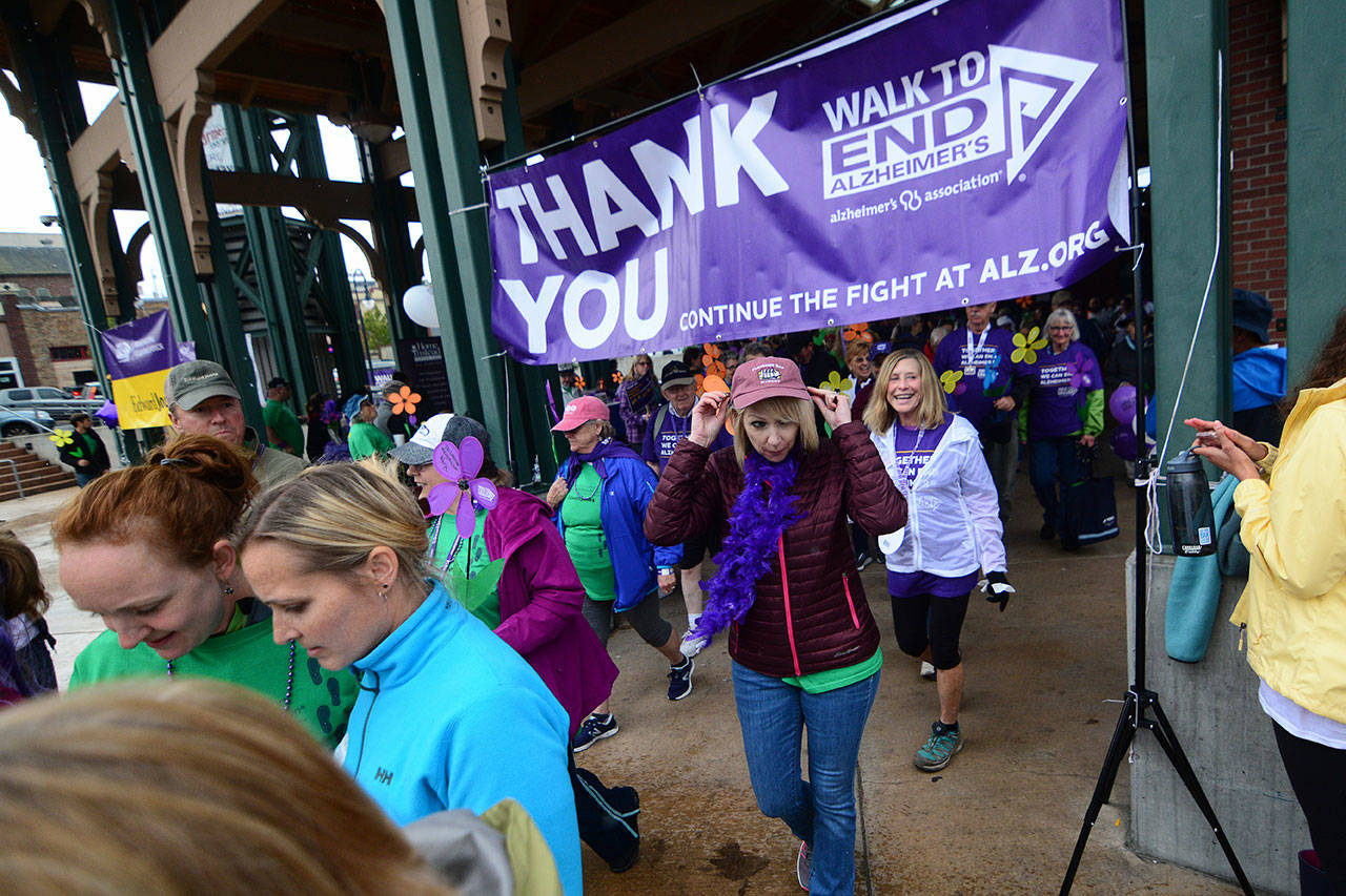 Participants in the Walk to End Alzheimer&rsquo;s start in downtown Port Angeles on Sunday. (Jesse Major/Peninsula Daily News)