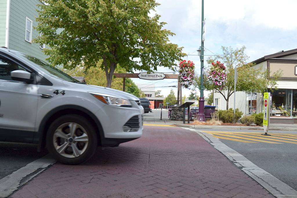 According to a consultants&rsquo; study for the city of Sequim, crosswalks like this west of Sequim Avenue on Washington Street are good for pedestrians but also contributing to slowing traffic flow east/west. (Matthew Nash/Olympic Peninsula News Group)