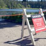 Caption: Anderson Lake in Chimacum is closed again due to toxic algae blooms. The lake will be closed to swimming, fishing and boating, however the state park will still be open to hikers. (Cydney McFarland/Peninsula Daily News)
