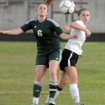 Port Angeles&rsquo; Emily Boyd, left, and Sequim&rsquo;s Gabbe Happe battle for the ball in the first half on Tuesday at Sequim High School.                                Keith Thorpe/Peninsula Daily News