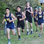 Forks&rsquo;s Samuel Gomez leads the pack at the Harriers at the Beach cross country race in Ocean Shores. Gomez went on to win the race.                                Lonnie Archibald/for Peninsula Daily News
