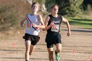 PREP ROUNDUP: Port Townsend’s Cantrell sprints to finish first, but Sequim boys take cross country meet