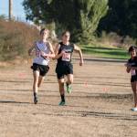 Port Townsend&rsquo;s Nathan Cantrell, left, and Sequim&rsquo;s Murray Bingham sprint to the finish during a cross country meet at Port Townsend Golf Club. Cantrell took the lead in the last 20 meters to pick up the win. Steve Mullensky/for Peninsula Daily News