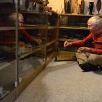 Pat Furey of Sequim sits with some of his train collection, including a 1935 Lionel Union Pacific Passenger train. Furey said he grew up in New York and used to visit the big train displays at Christmastime and be &ldquo;wowed.&rdquo; (Matthew Nash/Olympic Peninsula News Group)